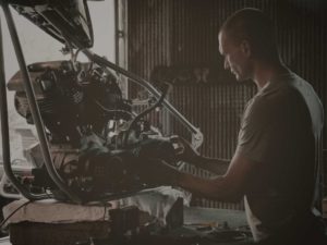 Mechanic Working on Engine